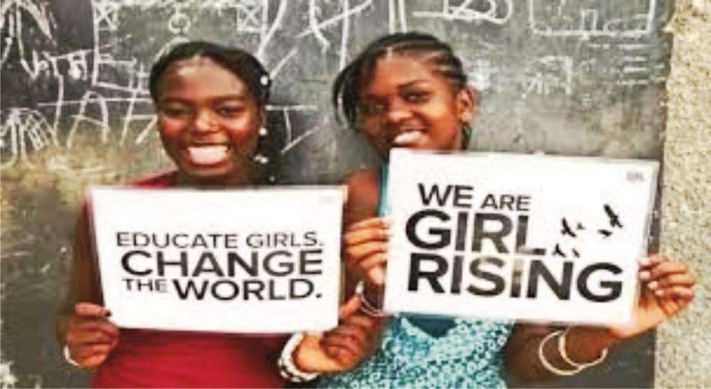 Girl child education in Nigeria showing school girls displaying placards for change