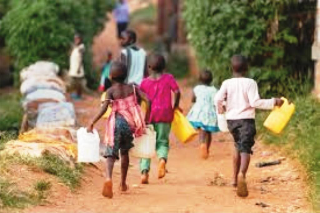 Girl child education in Nigeria showing girls of school age running to the stream to fetch water